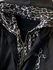 100% polyester Care instructions: Machine wash cold zip hoodie in Leopard with relaxed silhouette