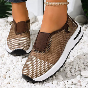 black slip-on sneakers