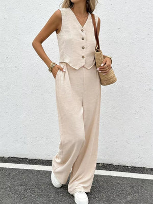 Chic beige button-down vest and flowing wide-leg pants set with textured fabric.