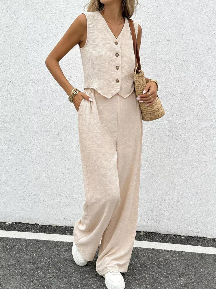 Chic beige button-down vest and flowing wide-leg pants set with textured fabric.