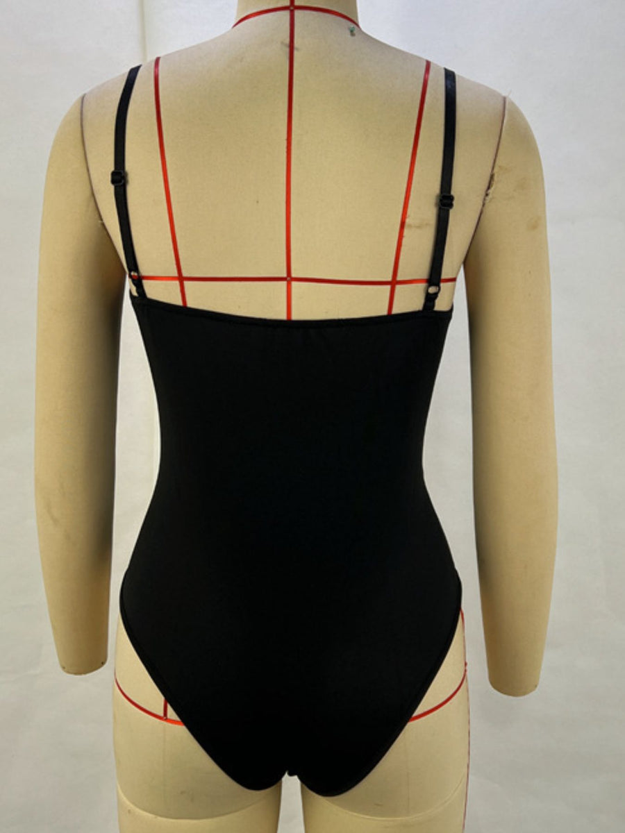 Black fitted bodysuit with sweetheart