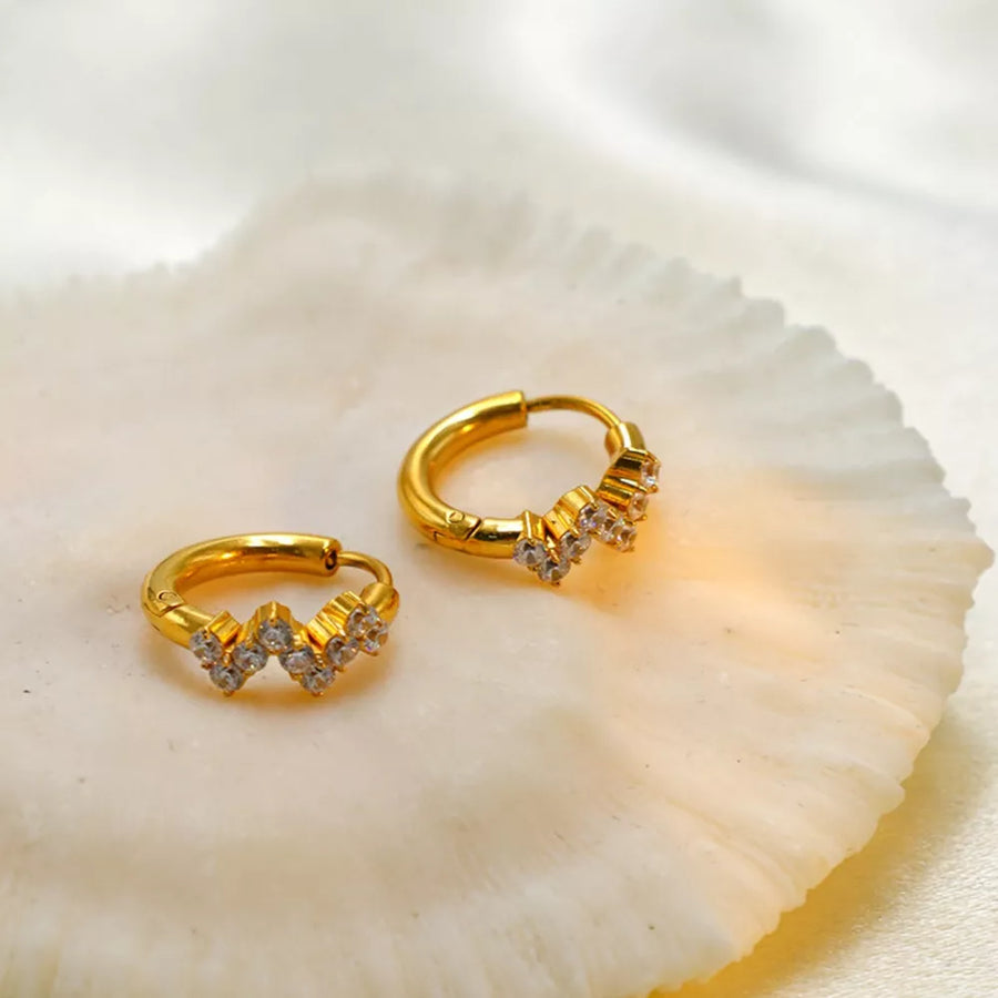clear earrings featuring zircon embellishment and geometric