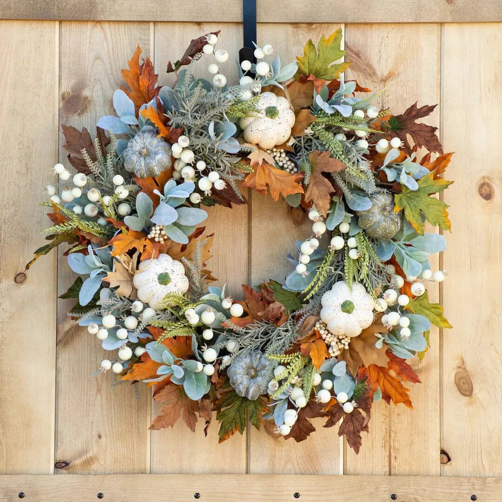 wreath in orange featuring decorative and round fit