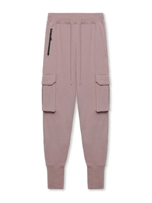 Dusty pink tech-knit cargo joggers with zip pocket and elastic cuffs