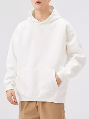White pocketed long-sleeve hoodie with a kangaroo pocket and relaxed fit.