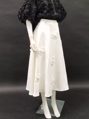 White midi skirt with floral applique detail, A-line cut