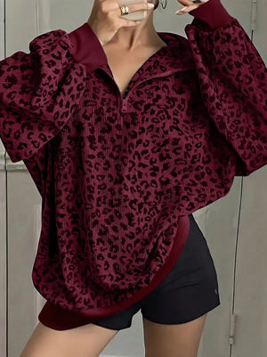 light grey sweatshirt with quarter-zip and leopard-print