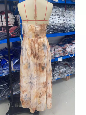 maxi dress in cream with floral and halter neck