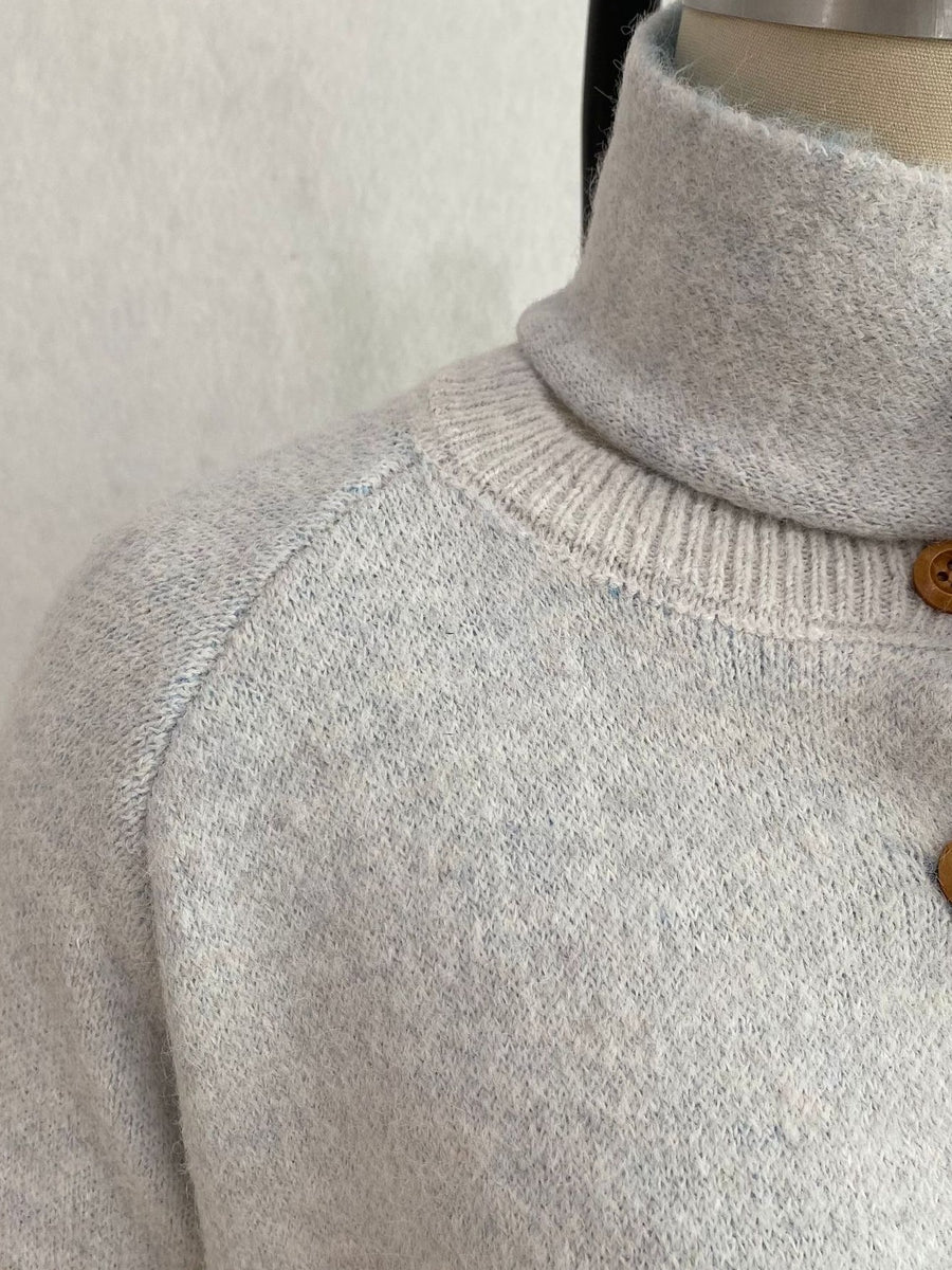 cardigan featuring geometric in light blue with 100% polyester Care instructions: Machine wash cold texture