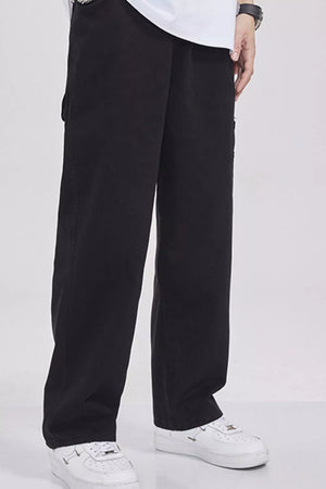 Relaxed fit black cargo sweatpants with utility pockets and a casual style.
