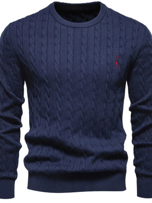 Navy cable knit crewneck sweater with red embroidered detail
