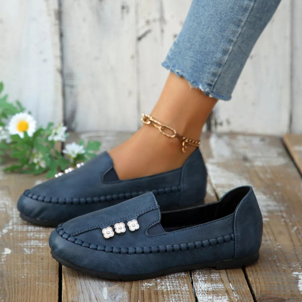 slip-ons in navy blue featuring round toe and regular fit