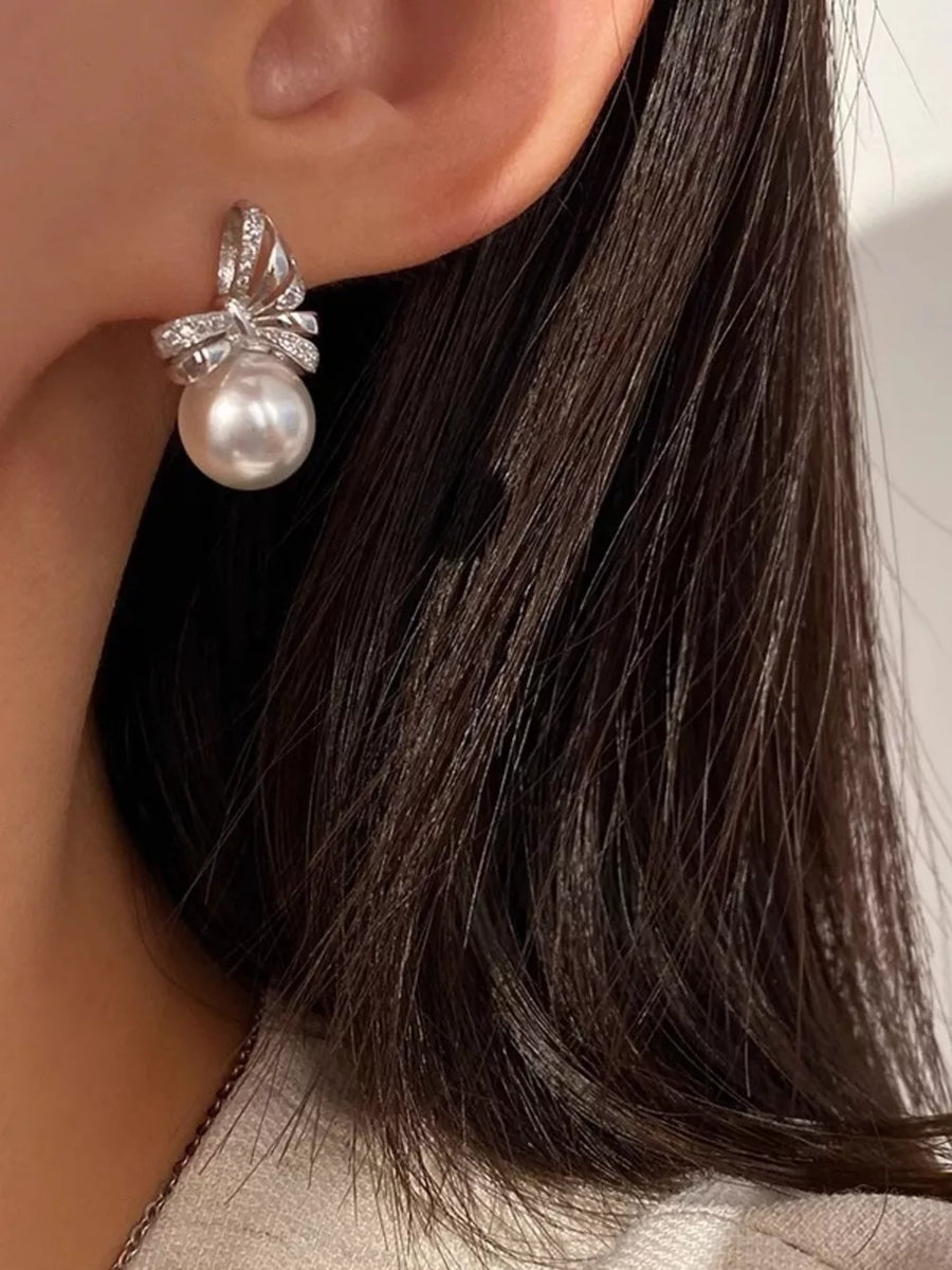 Synthetic Pearl,925 silver needle,Zircon Care instructions: Avoid wearing during earrings in cream with drop silhouette