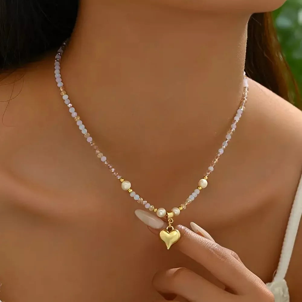 necklace in gold featuring beaded and fitted fit