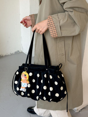 shoulder bag in Black with polka dot and drawstring sides