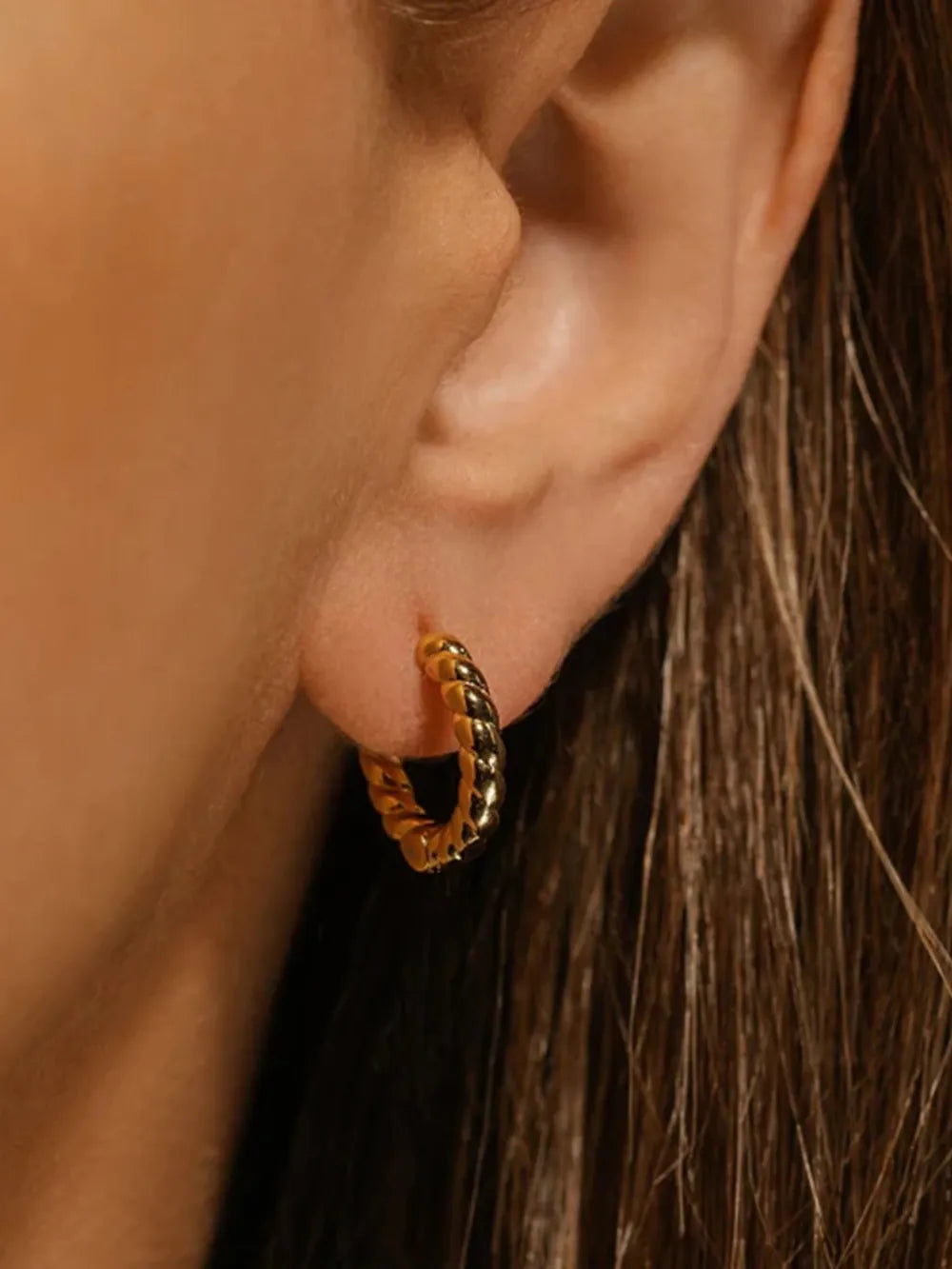 Gold twisted mini hoop earrings with a rope texture, 18K gold-plated.