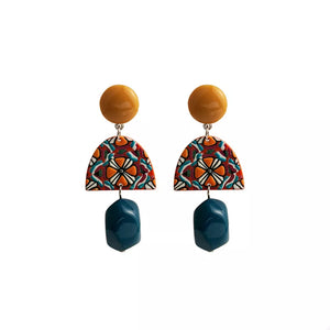 earrings in teal with geometric and drop design
