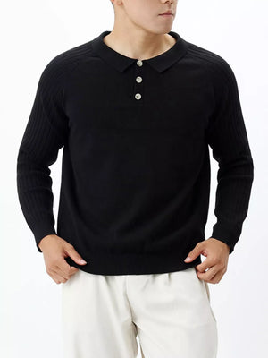 Black cotton knit polo shirt with ribbed sleeves and a three-button placket.