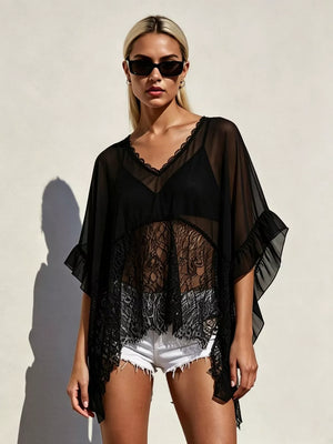 Black sheer flowing cover-up with lace trim and ruffled sleeves.