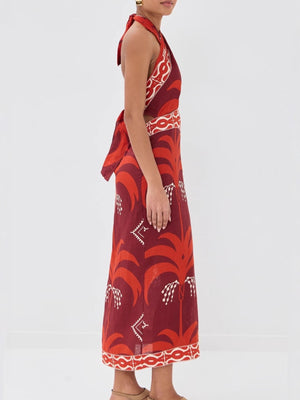 Tropical print halter neck maxi dress with cutout detail and tie back.