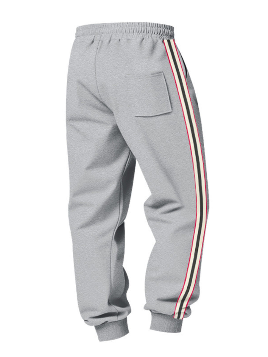 Black joggers with drawstring and striped