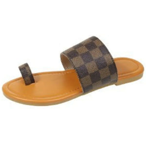 Brown checkered toe-loop flat sandals with a tan sole.