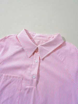 Pink striped polo shirt with white buttons and a chest pocket.