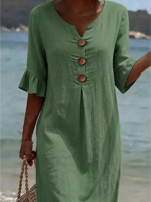 Green ruffled sleeve button detail dress with V-neck and three wooden buttons.