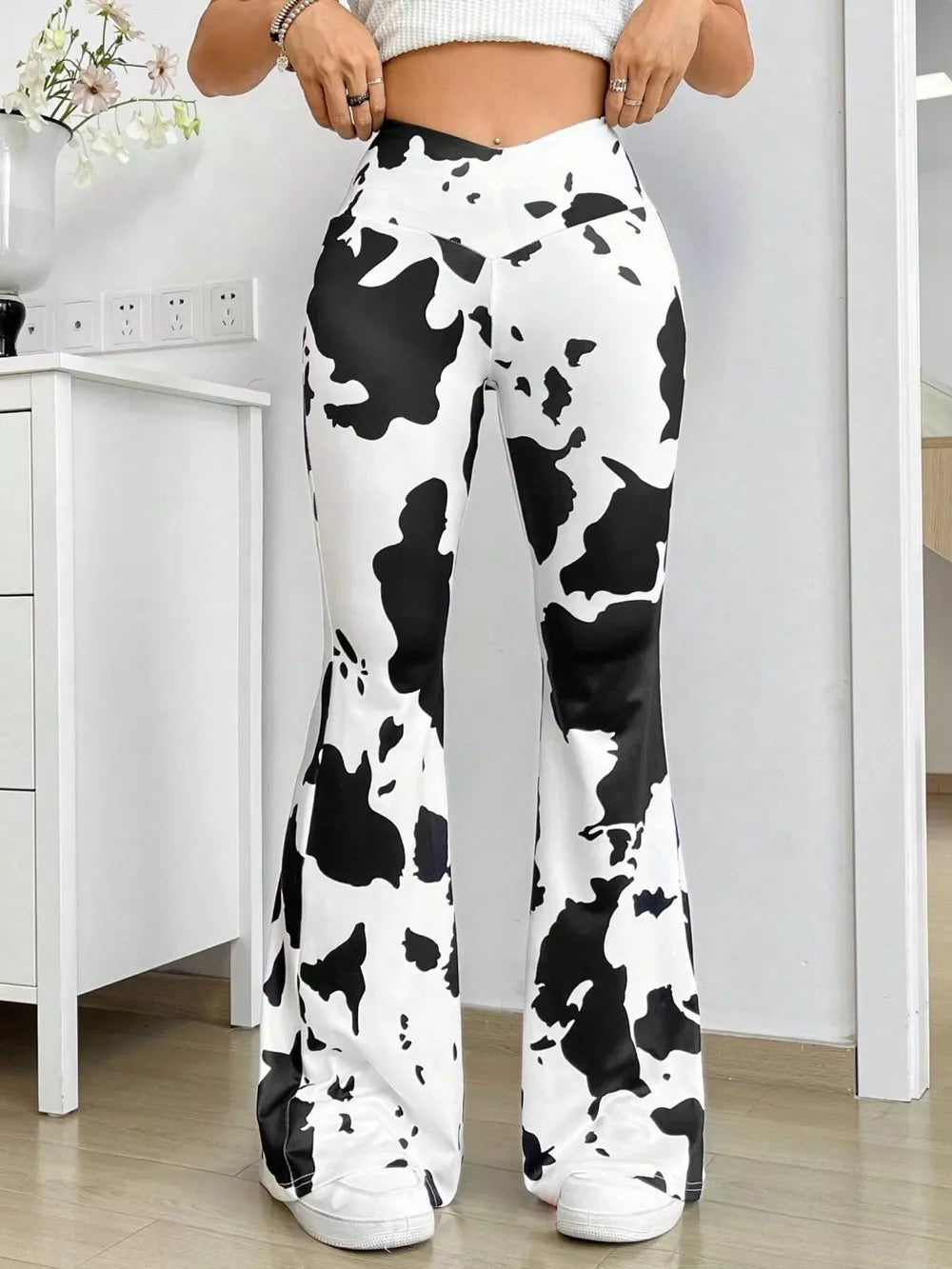 Cow Print Flared Pants in Black