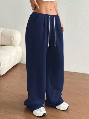 Dark blue wide-leg lounge pants with drawstring waist and pockets.