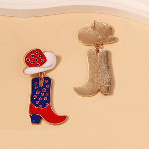 Cowgirl boot and hat dangle earrings with red, white, and blue enamel details.