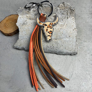 Cowhide bull skull keychain with leopard print and multi-color fringe tassels.