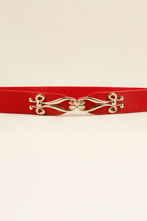 Red elastic belt with ornate gold clasp and faux leather trim
