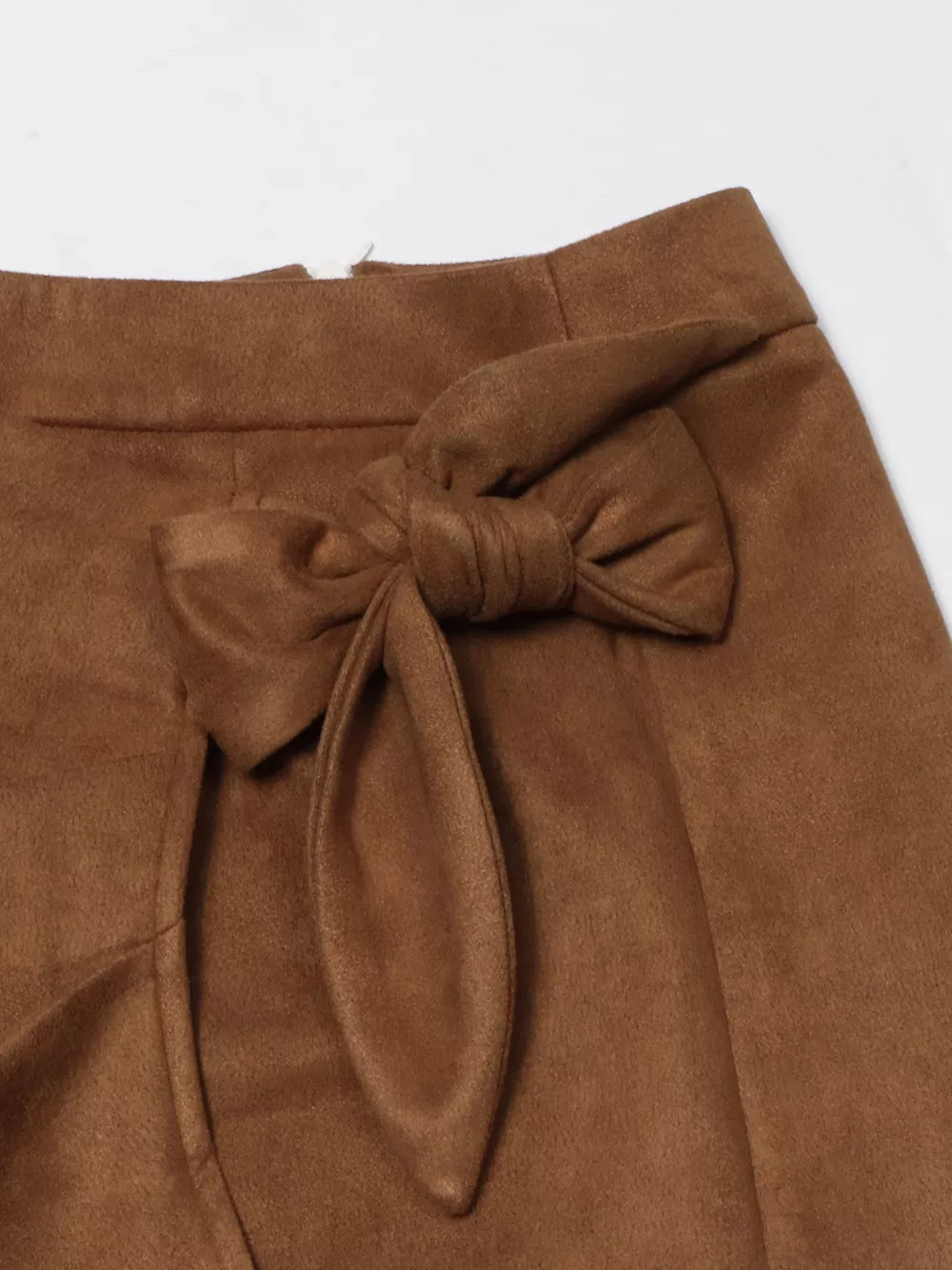 Brown midi skirt with a tie waist and slit detail.