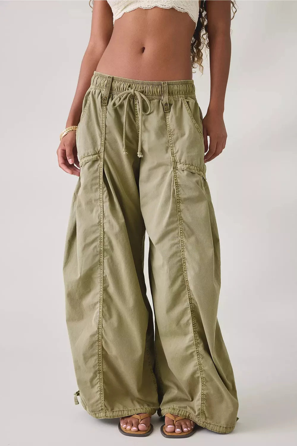 100% polyester Care instructions: Machine wash cold cargo pants in Coffee Brown with wide-leg silhouette