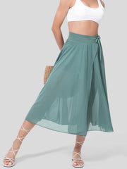 Flowy midi skirt in light blue with shorts liner and drawstring detail.