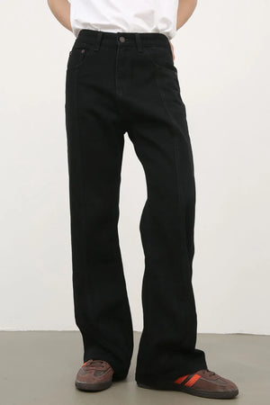 Black flare jeans with panel seams and a casual fit.