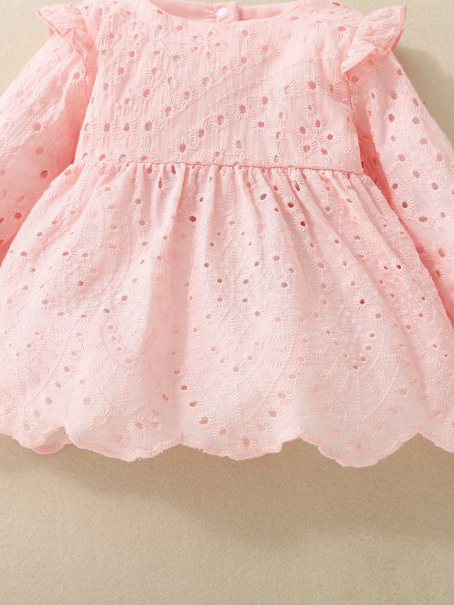 Pink embroidered lace baby top with ruffled sleeves and scalloped hem
