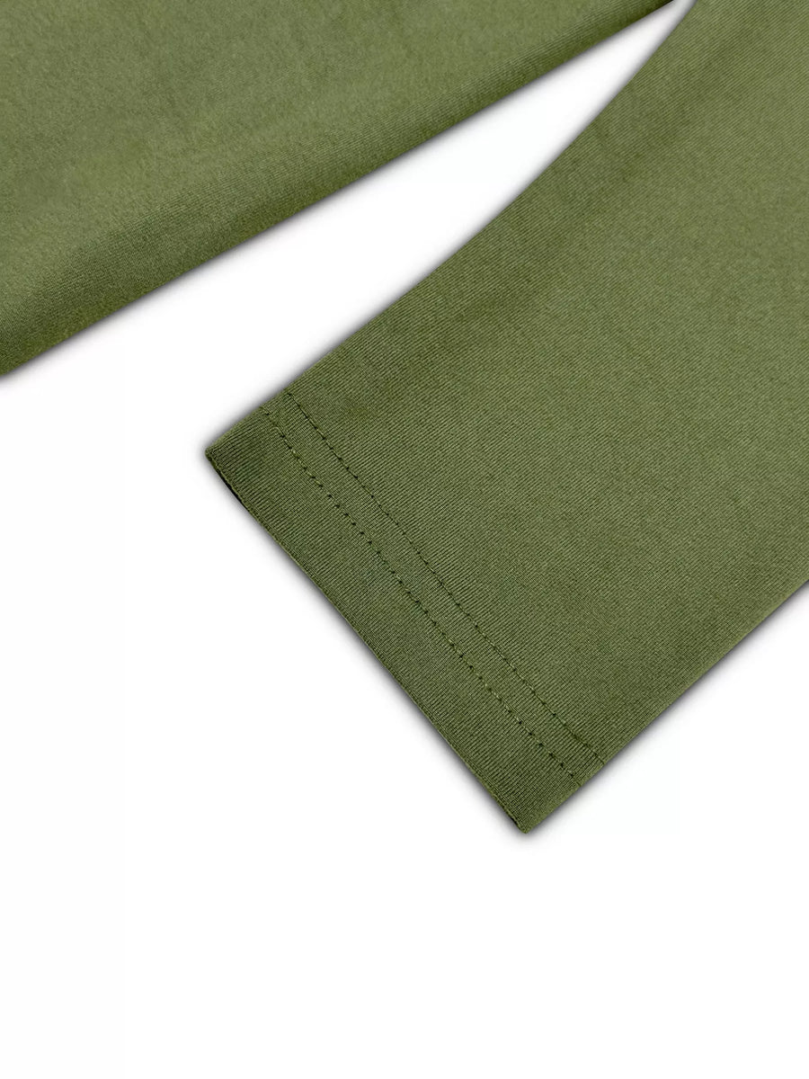Moss green long sleeve loungewear detail showing hem stitching