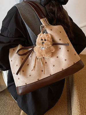 handbag in Tan with polka dot and bow detail