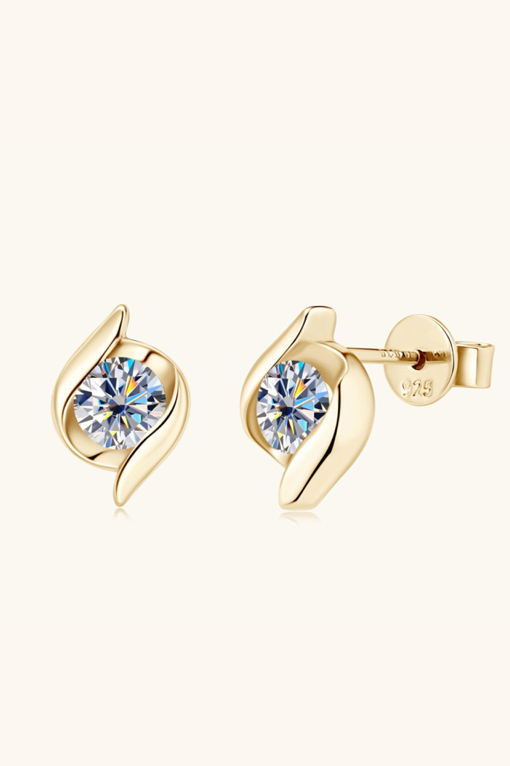 Gold solitaire stud earrings with 925 sterling silver backing and a sculpted design.