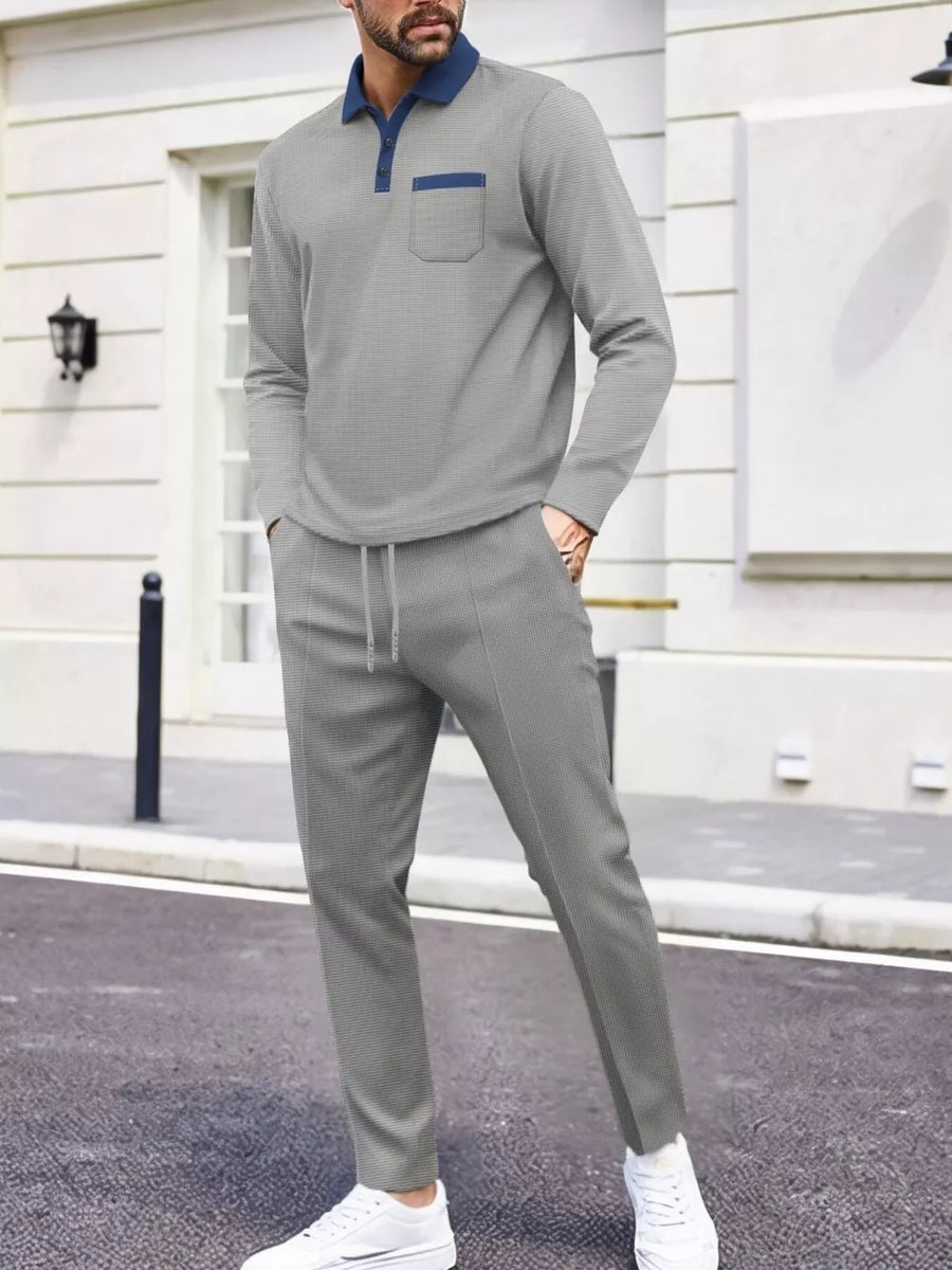 Men's gray two-piece lounge set with polo shirt and drawstring pants.