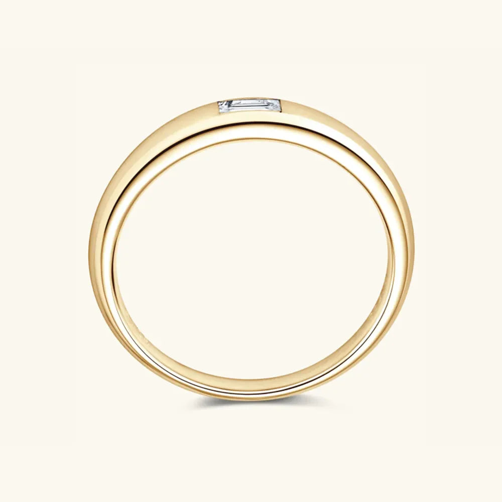 Gold baguette cut moissanite band ring with a single rectangular diamond.