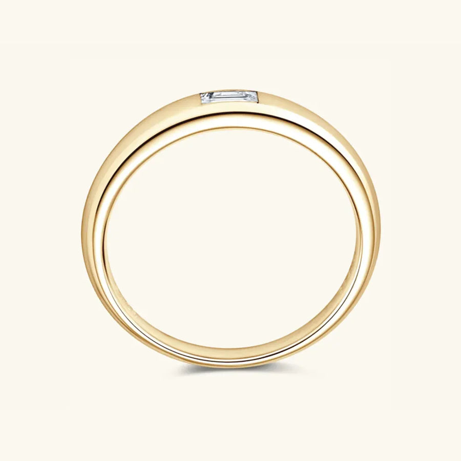 Gold baguette cut moissanite band ring with a single rectangular diamond.