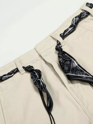 Cream white maternity pants with black paisley print scarf belt detail