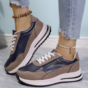 Zipper detail lace up sneakers in navy and taupe with a chunky sole.