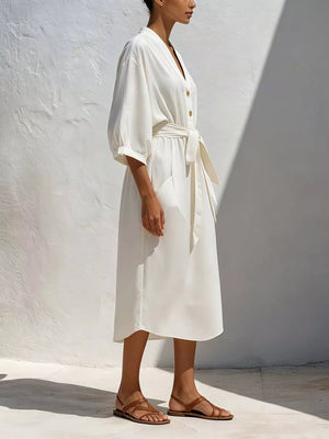 100% polyester Care instructions: Machine wash cold midi dress in Light Blue with relaxed silhouette