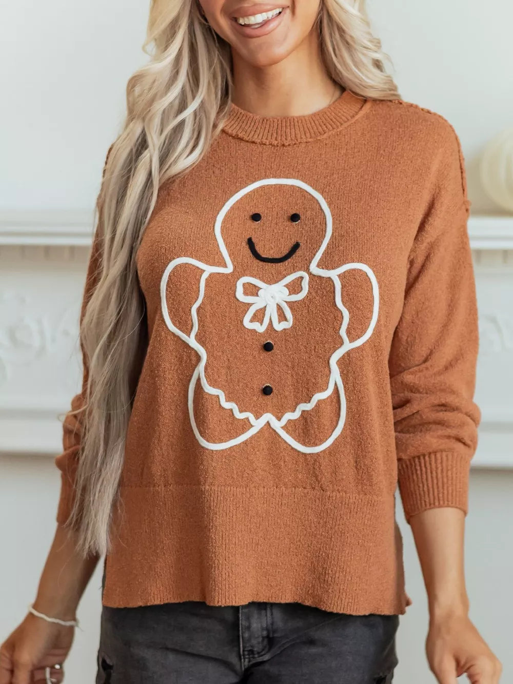 Caramel pullover sweater featuring drop shoulder and graphic-print