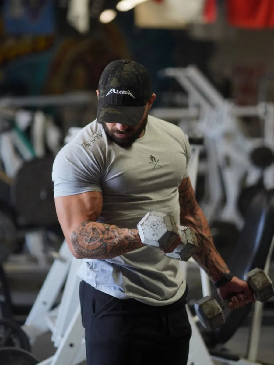 Gray Spartan graphic muscle fit tee with crew neck and short sleeves.