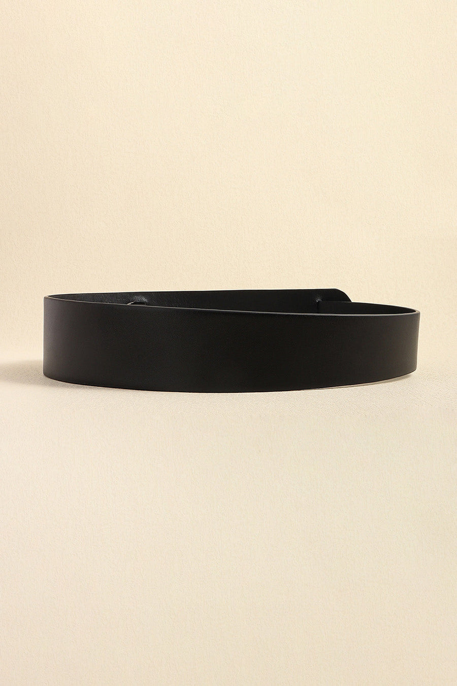 Black sculpted leather waist belt with adjustable buckle detail
